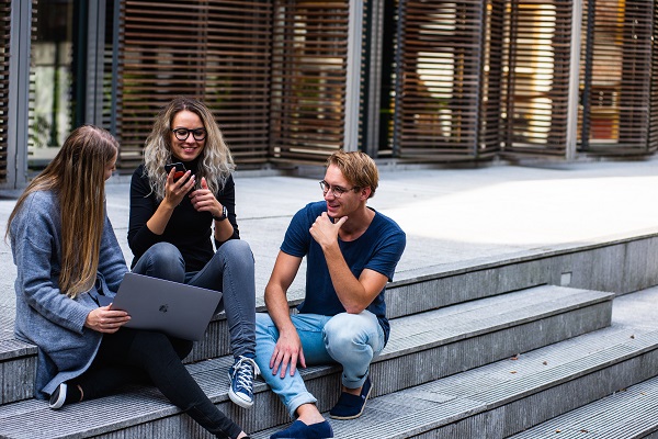 three people sitting